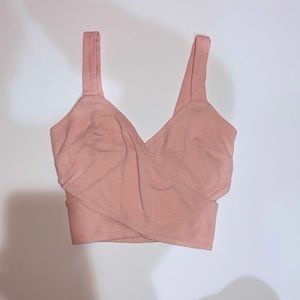 Cute light pink cross wrap crop top w/ side slits
